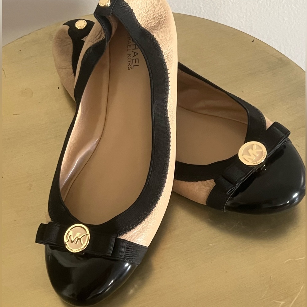 Never worn! Black and nude Michael Kors flats